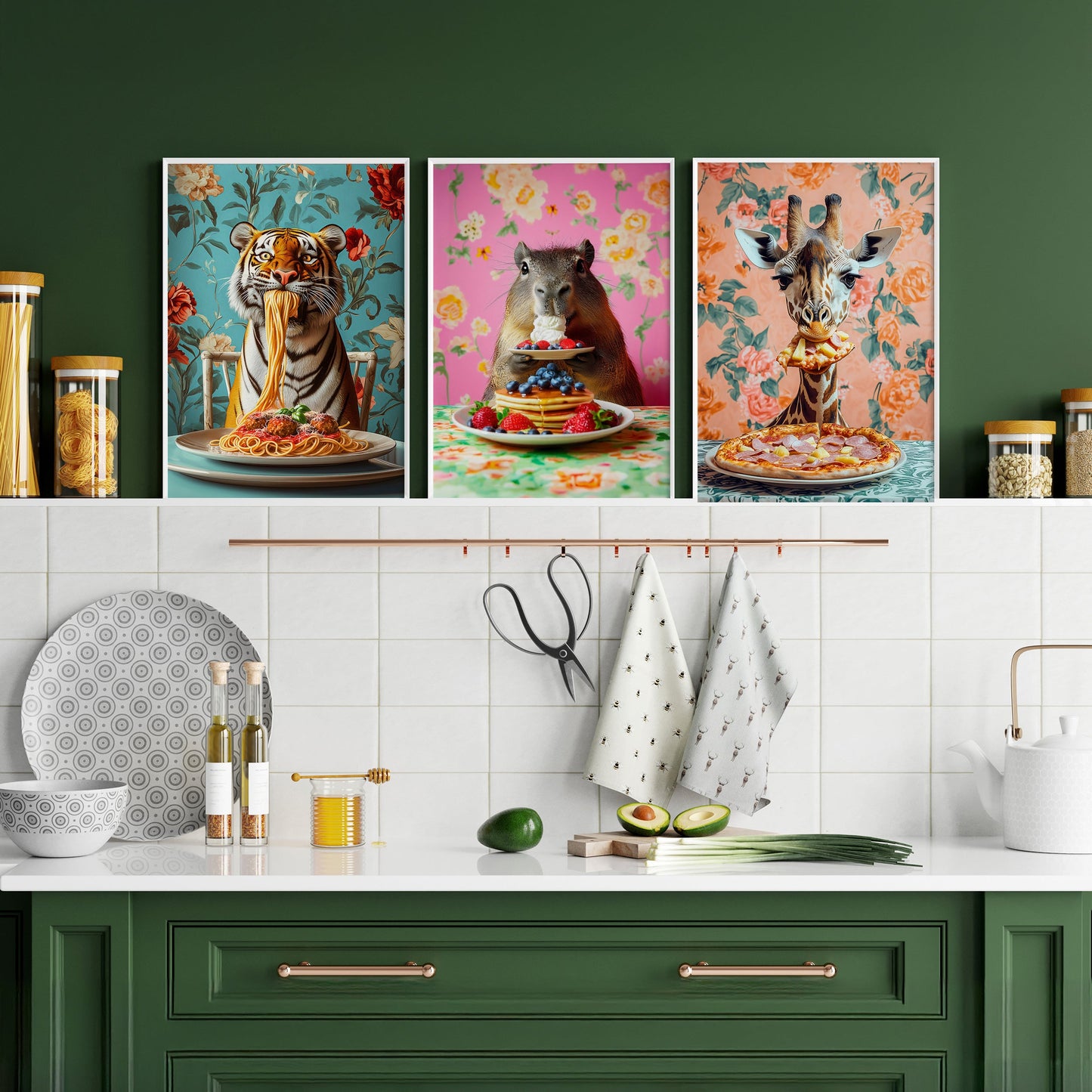 a kitchen with green cabinets and artwork on the wall