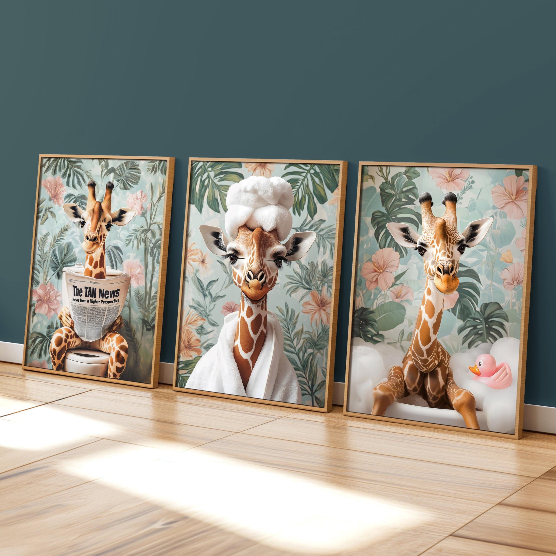 three framed pictures of giraffes in a room